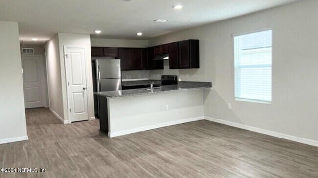 Foto del edificio - 6450 Sweetbay Ln