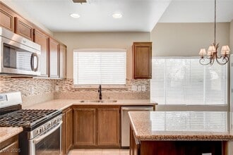 Building Photo - 9037 Trumpet Ct