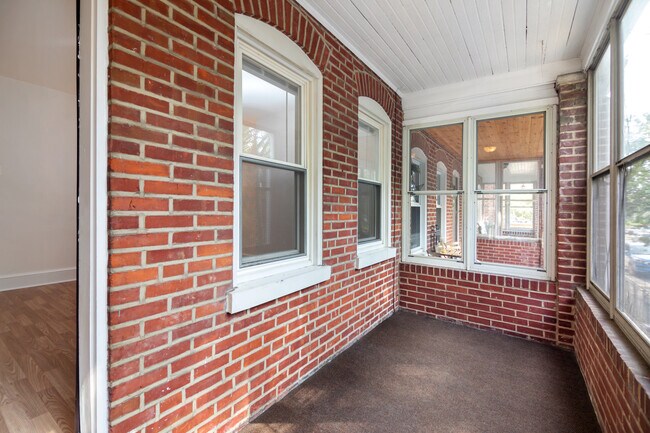 Enclosed front porch - 724 Woodlawn Ave