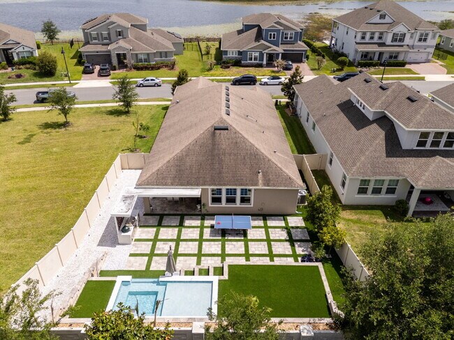 Foto del edificio - "Spacious 4-Bedroom Retreat with 3 Full Baths in Winter Garden's Serene Sanctuary"