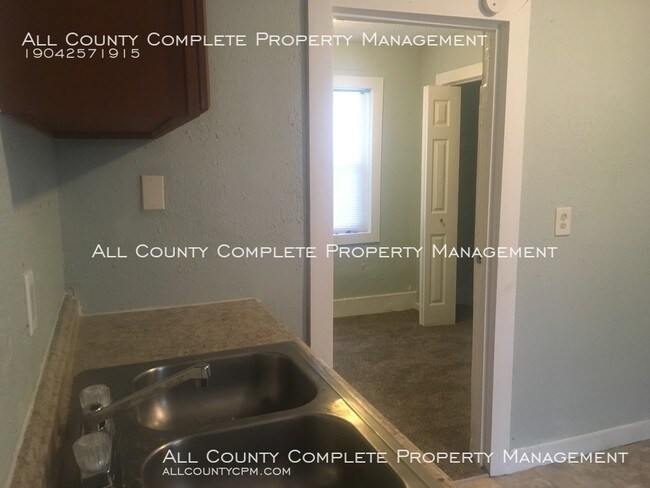 Building Photo - Price Improvement! Four-Bedroom Home