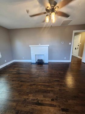 living room fireplace - Adams Apartments