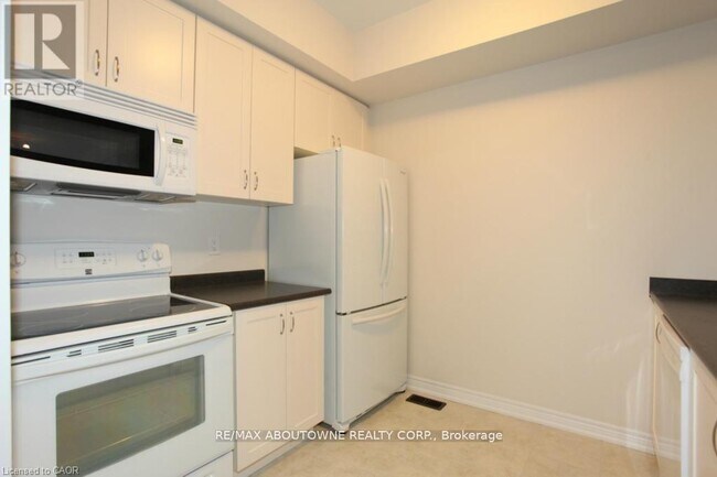 Photo du bâtiment - 1401 Plains Rd E