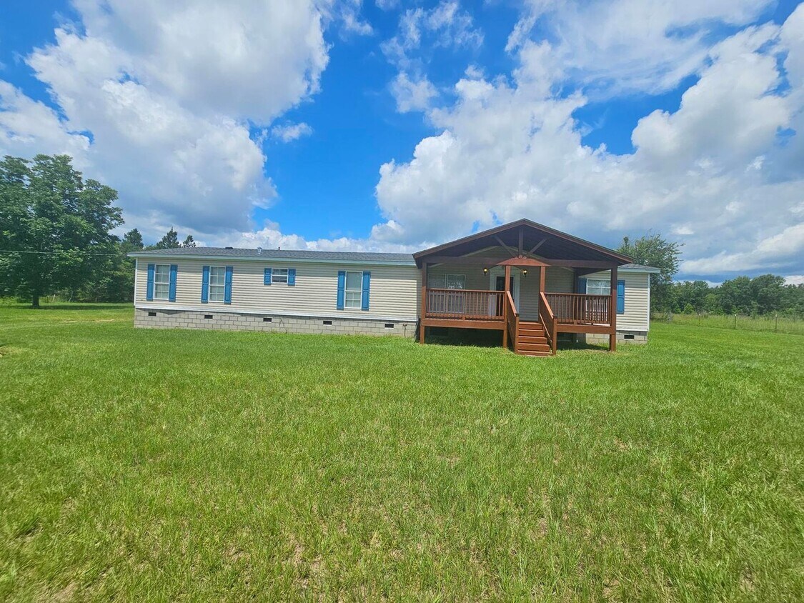 Primary Photo - Peaceful living 4BR/3BA Home with plenty o...