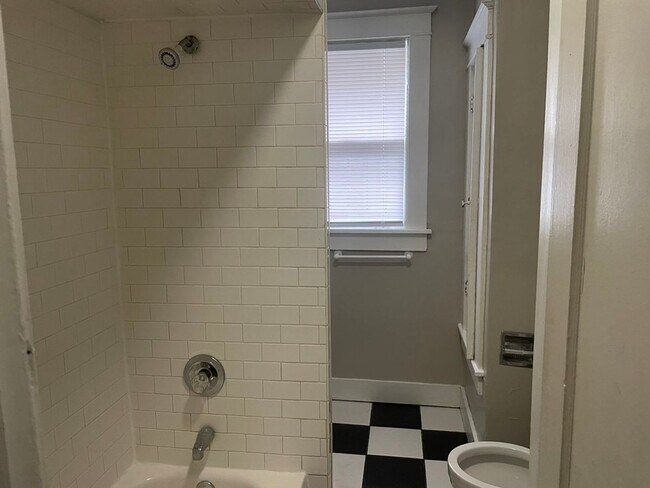 Building Photo - Charming 3-Bedroom Midtown Bungalow with Hardwood Floors & Spacious Backyard Deck