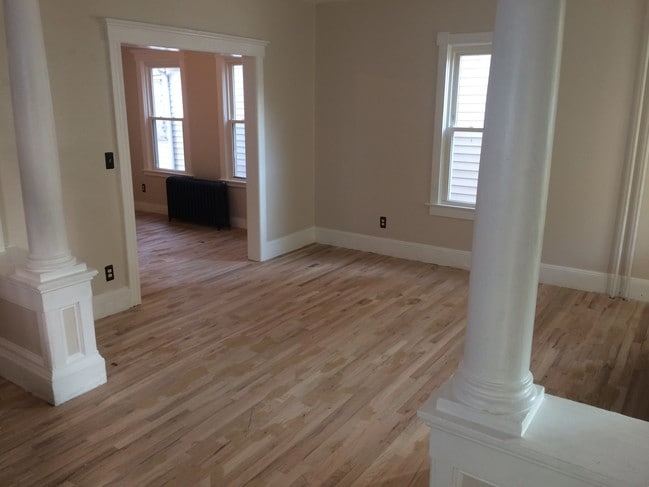 Living room from foot of stairs. - 1027 Sewall Ave