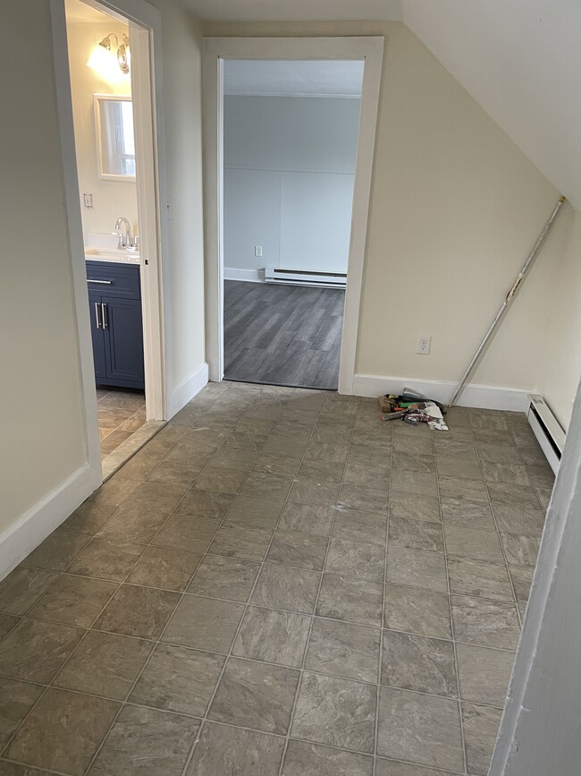 Wide hallway between kitchen & living room - 218 South Ave