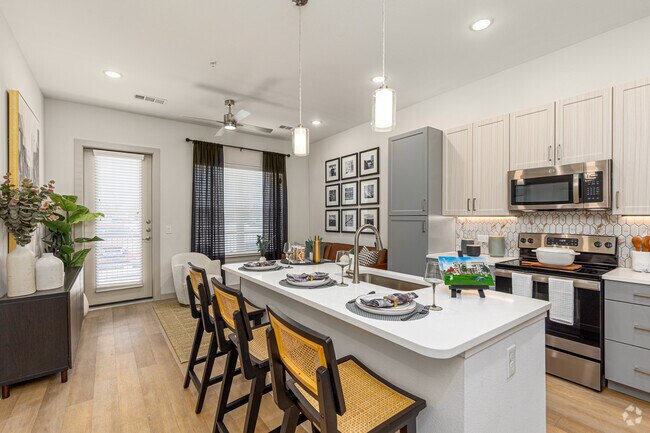 1BR, 1BA - 700SF | A1 - Kitchen - Alpine Ten55