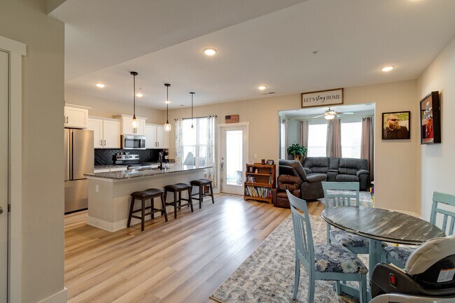Large open living space that flows into the Florida room or out onto the private patio. - 6063 Hillside Ln