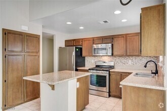 Building Photo - 9037 Trumpet Ct