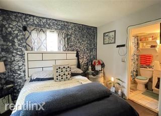 Building Photo - 1 br, 1 bath Condo - 7120 Waterside Dr # 3...