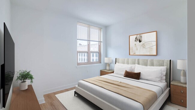 Dormitorio con suelo de superficie dura - Liberty Tower