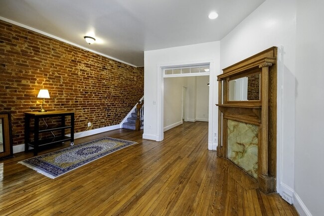 Building Photo - Historic & Charming 3BR Rowhouse near Howard is Move-in Ready!