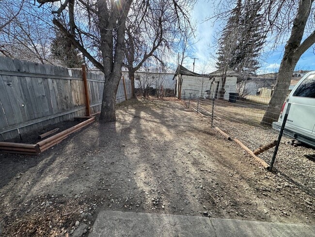 Building Photo - Private 2 Bed / 1 Bath Furnished Bungalow – Tucked Away & Move-In Ready – $1,300/Month