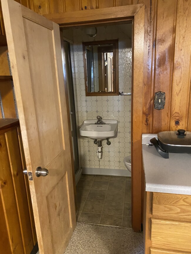 Small bathroom with a shower - 1402 Broadway N