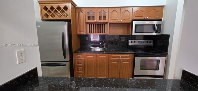 Building Photo - 7420 W 20th Ave