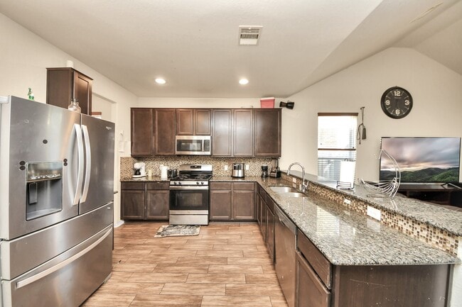 Building Photo - 8227 Pastel Dawn Trce