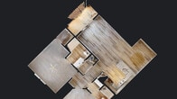 Located at 1034 Finnwood Dr in Whitsett, NC, this single-floor residence offers a thoughtfully designed layout with 2 bedrooms, 2 bathrooms, and a well-utilized floor plan. The open-concept living, dining, and kitchen area forms the heart of the home, finished with light wood-tone flooring throughout the main areas. The kitchen is equipped with dark espresso cabinetry, granite-style countertops, white appliances including a range, built-in microwave, refrigerator, and dishwasher, plus a dedicated pantry for added storage. Track lighting overhead enhances the functional workspace. The living area features neutral warm-toned walls and flows directly to a private balcony through double French doors, inviting natural light and outdoor views. Both bedrooms are carpeted and finished in soft neutral tones, with the spacious primary bedroom offering an en-suite bathroom and a dedicated closet. The bathrooms feature light wood-tone flooring, dark vanity cabinetry, tiled tub-shower combinations, and chrome fixtures. Additional conveniences include a hallway connecting all rooms, a dedicated laundry area, and two closets throughout. The overall ambiance is clean, functional, and move-in ready.