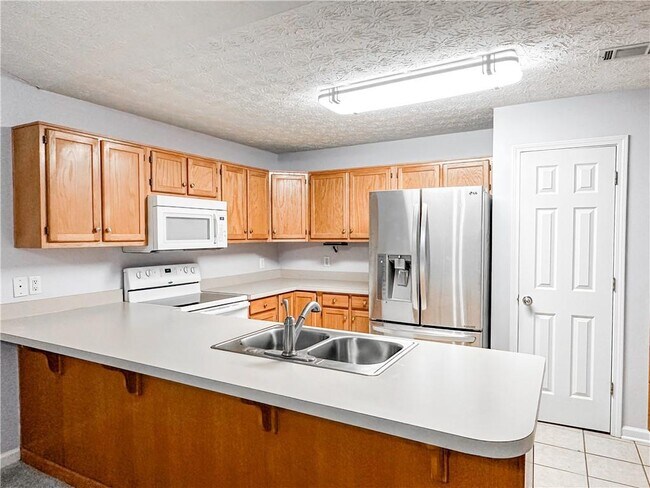 Foto del edificio - 3955 Hidden Hollow Dr