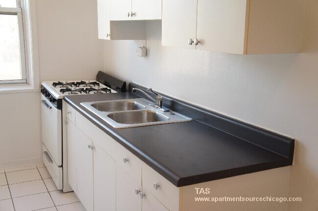 Foto del edificio - 3046 W Wellington Ave