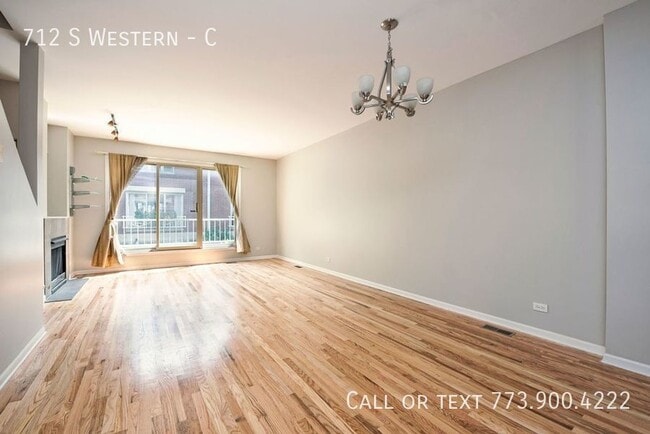 Building Photo - 712 S Western-C