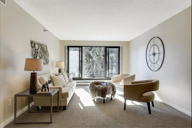 Building Photo - 1Bd/1Ba with Heated Parking, Stainless Steel Appliances, and Pool Access