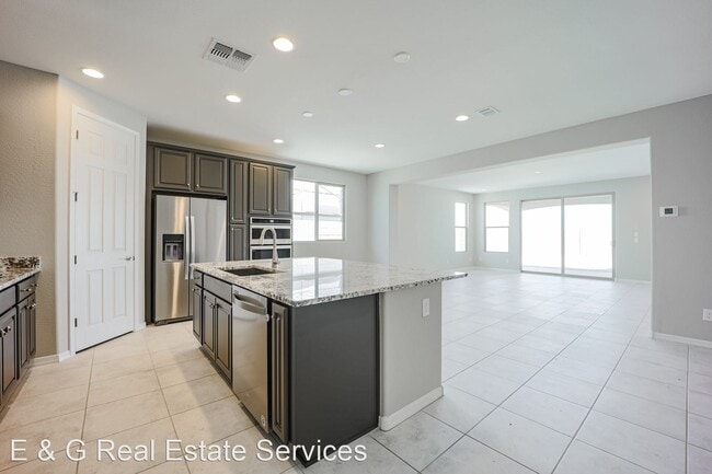 Building Photo - 4 br, 2 bath House - 8938 W Marshall Ave