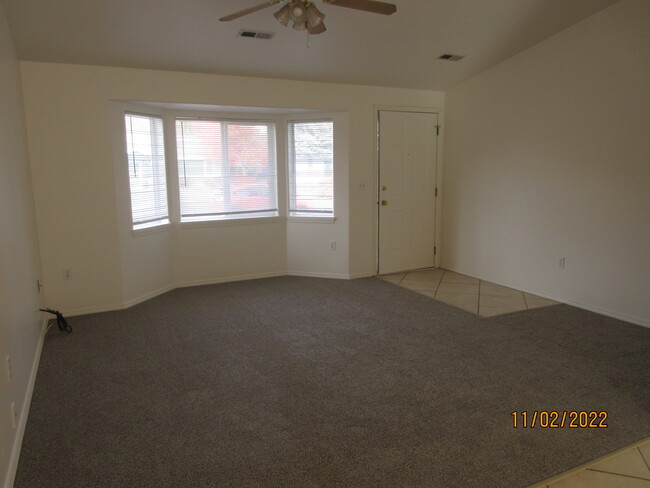 living room - fresh paint, new carpet - 12609 W 10th Ave