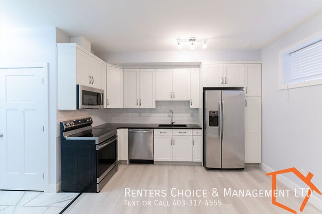 Building Photo - NEW PRICE! 2 Bedroom Basement Suite Utilities Included