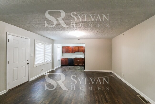 Building Photo - The living is easy in this 3 bedroom, 2 bathroom home