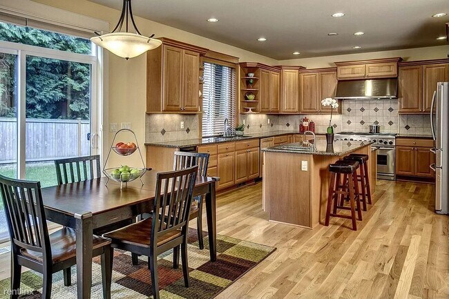 Building Photo - 4 br, 3.5 bath House - 4540 108th Avenue N...