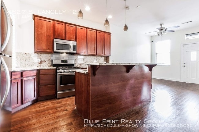 Building Photo - 4627 S Langley Ave