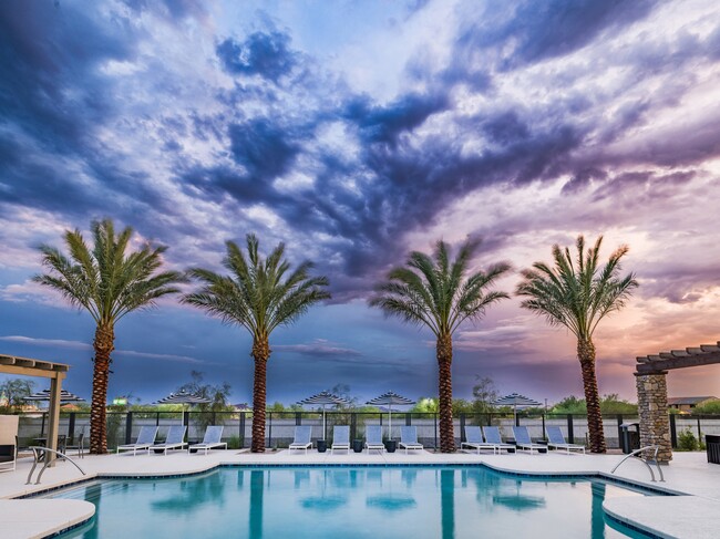 Escape the heat in style! Our resort-style pool with a covered pergola is your new favorite summer spot. - Amavi Aster Ridge