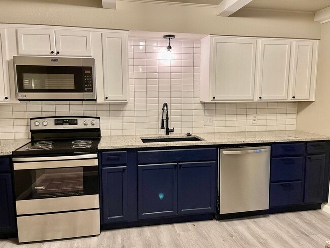 Building Photo - COMPLETE REMODEL - 3 BED 2 BATH 2 CAR - LO...
