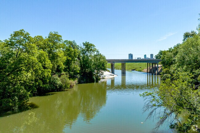 The Trinity River flows on the outskirts of the Northside neighborhood.