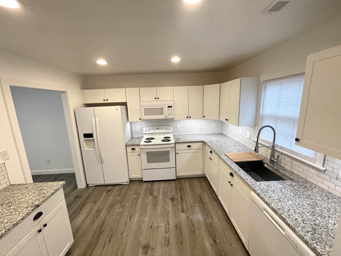 This beautiful kitchen has been fully updated and renovated. - 14553 Old Courthouse Way