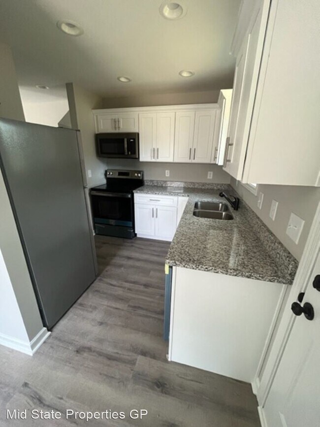 Building Photo - 3 br, 2 bath House - 320 S. Magnolia St.