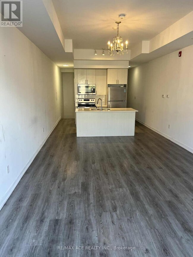 Building Photo - 3686-3686 St Clair Ave E