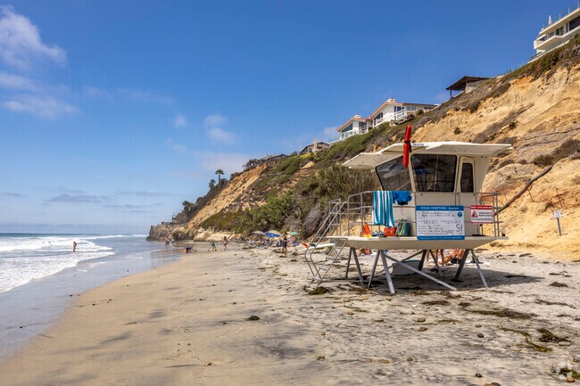 Encinitas Parks Leucadia State Beach shoreline near lifeguard station.