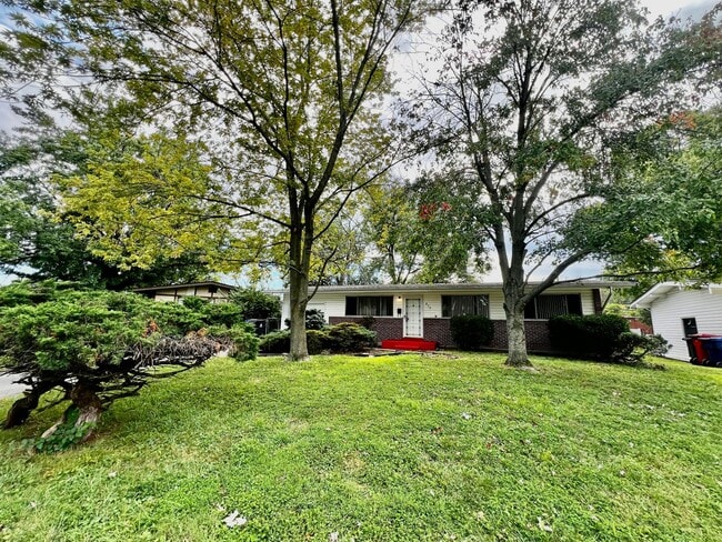 Building Photo - Ranch freshly painted in ideal location of...