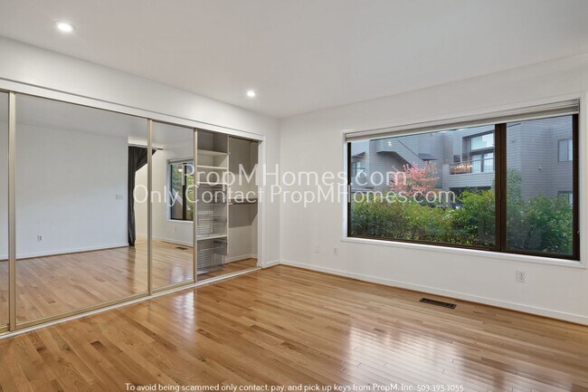 Building Photo - Riverside Elegance: Discover Luxurious Liv...