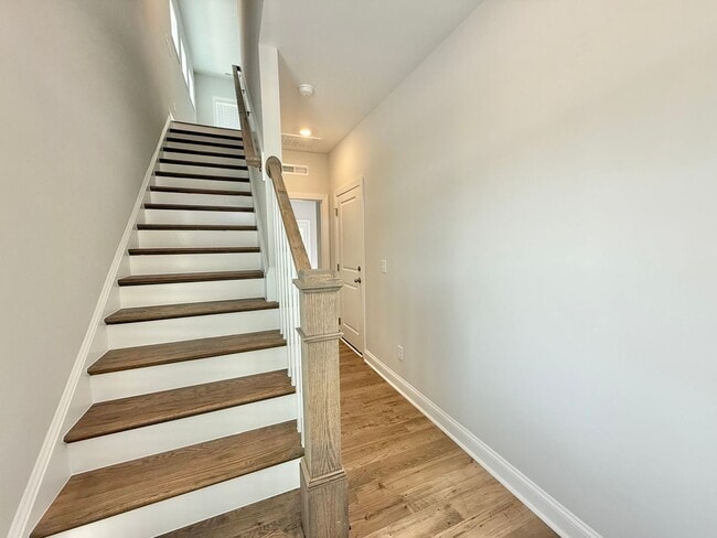Building Photo - Stunning End Unit New Construction 3BD, 3....