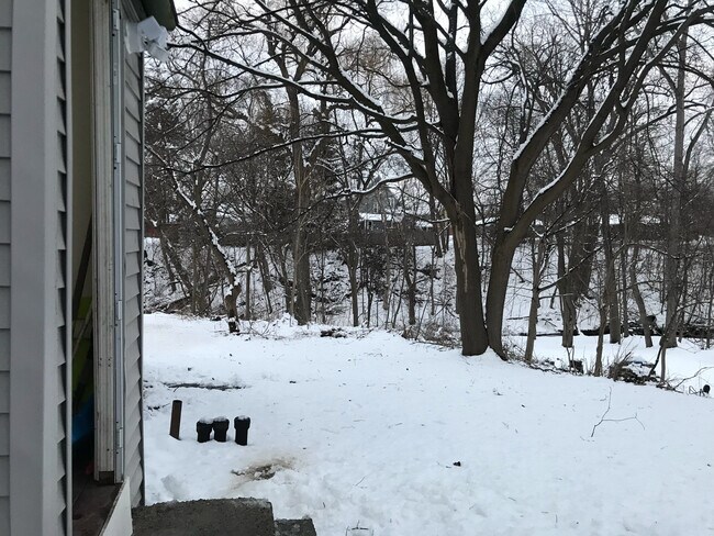 View of backyard. Private entrance is on the left. - 31 Sand Creek Rd