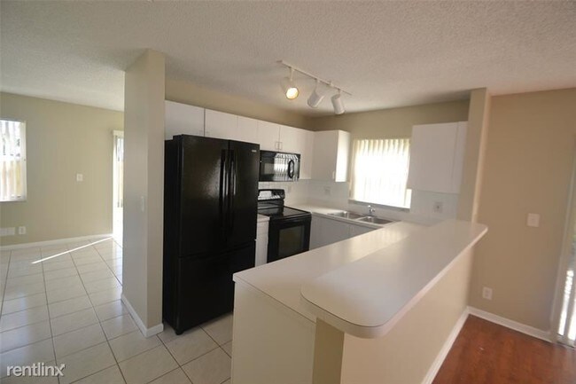 Building Photo - 6408 Rock Beauty Ter
