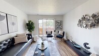 Located at 2149 E Sunshine St in Springfield, Missouri, Unit B209 is a thoughtfully designed single-floor residence that combines modern finishes with comfortable, functional living. The open-concept living area is anchored by light wood-look flooring, crisp white walls, and a textured ceiling, creating a clean and inviting atmosphere. A sliding glass door floods the space with natural light and opens onto a private balcony with outdoor views, making it a standout feature of the living room.

The kitchen is efficiently laid out with white cabinetry, granite-style countertops, and a full suite of stainless steel appliances, including a refrigerator, electric range, and dishwasher. Recessed lighting adds a polished touch to the functional workspace.

The bedroom offers a cozy retreat with plush carpeting, a ceiling fan, a closet, and a bright window that allows natural light to filter in. The bathroom is well-appointed with a granite-topped vanity, a tub/shower combination, and wood-look flooring that ties the space together cohesively.

Throughout the unit, the design balances practicality and style, with consistent finishes and thoughtful details that create a comfortable, modern living environment in the heart of Springfield, MO.