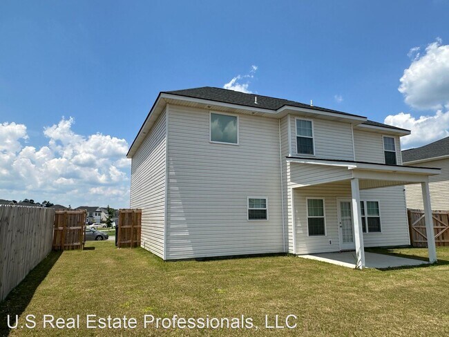 Foto del edificio - 4 br, 2.5 bath House - 125 WW Winn Ave