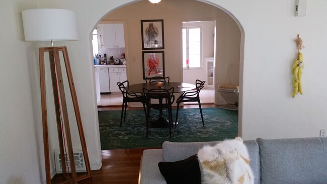 vintage charge with curved ceiling details. View from living room to dining room - 1362 S Mansfield Ave