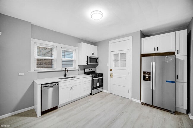 Foto del edificio - 4 br, 2 bath House - 1511 East 85th Street