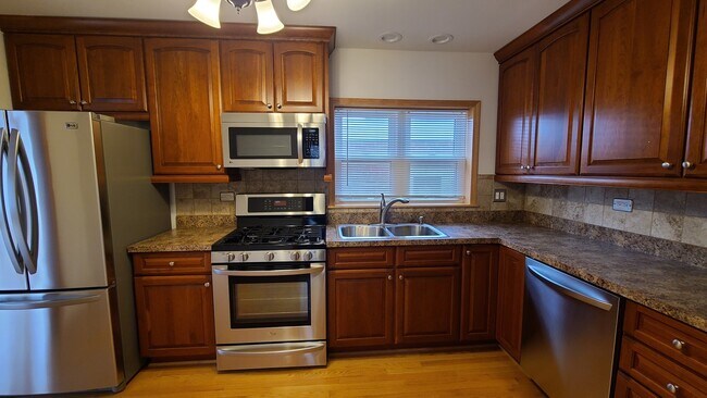 Foto del edificio - 7044 W Farragut Ave