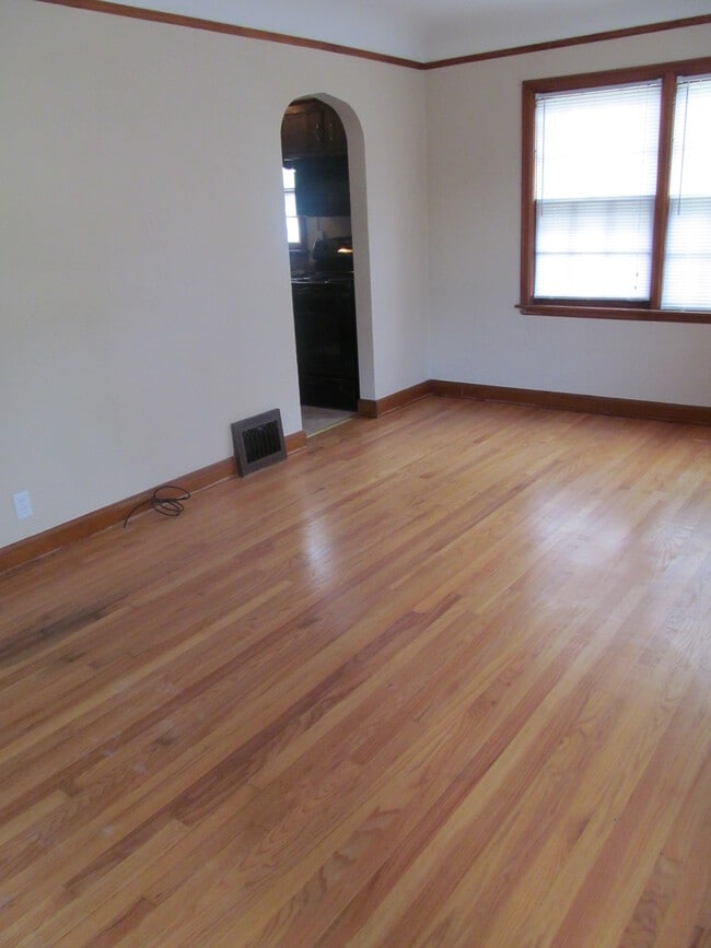 Living room view with entry to kitchen - 2231 Hamilton St SW